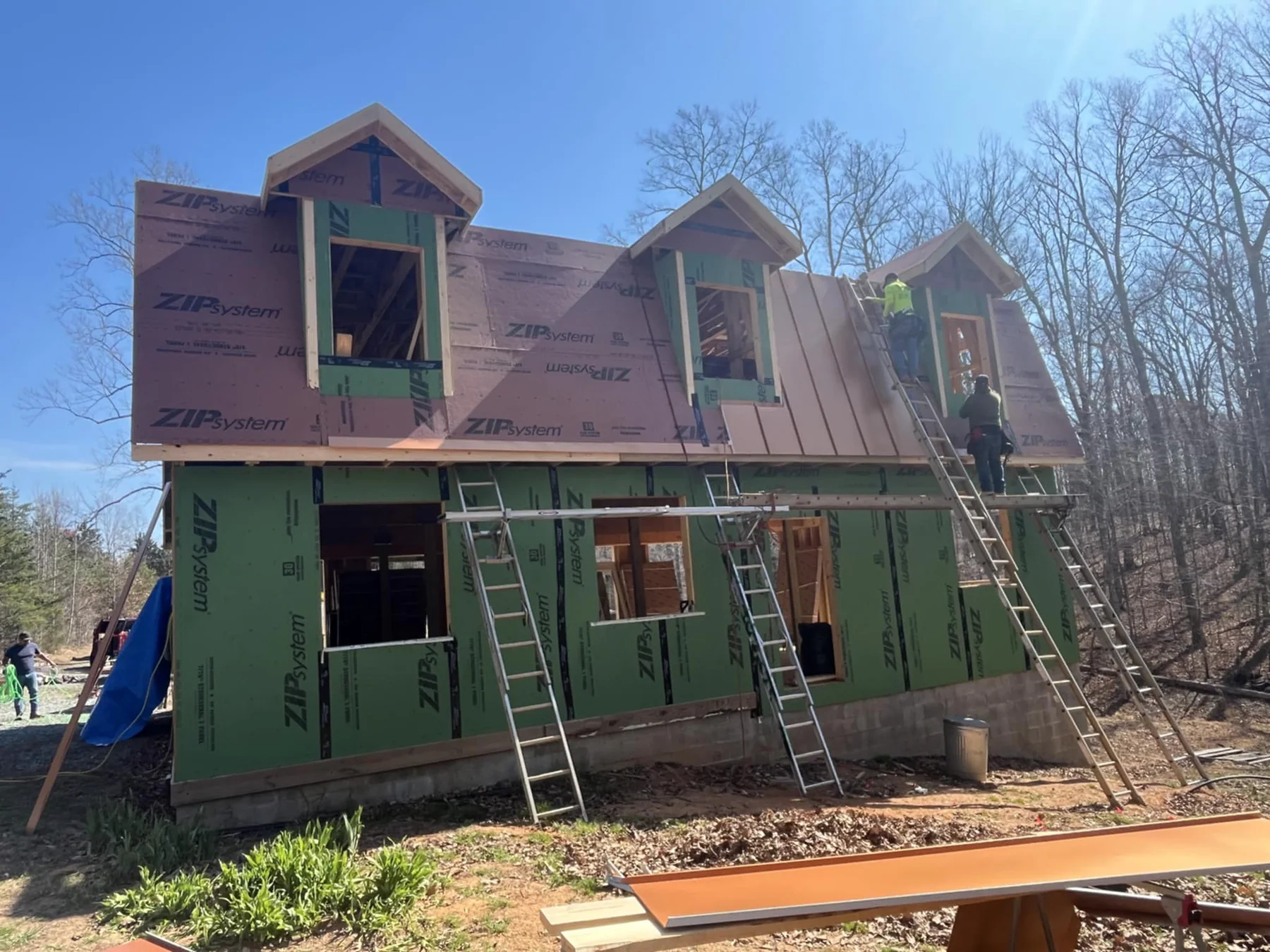 House addition weatherproofing and exterior construction in progress
